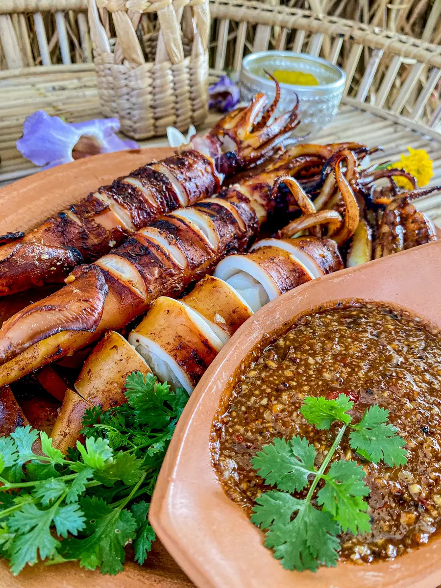 Nam jim seafood sauce served with grilled squid.