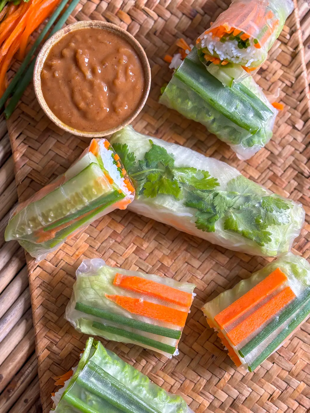 Thai fresh spring rolls served with peanut sauce.