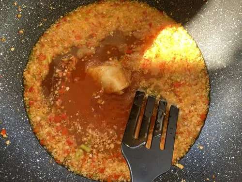 Thai mookata sauce cooking in a wok.