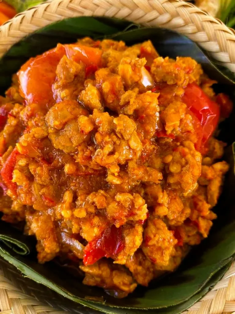 Close-up of nam prik ong, a Thai pork and tomato dipping sauce.