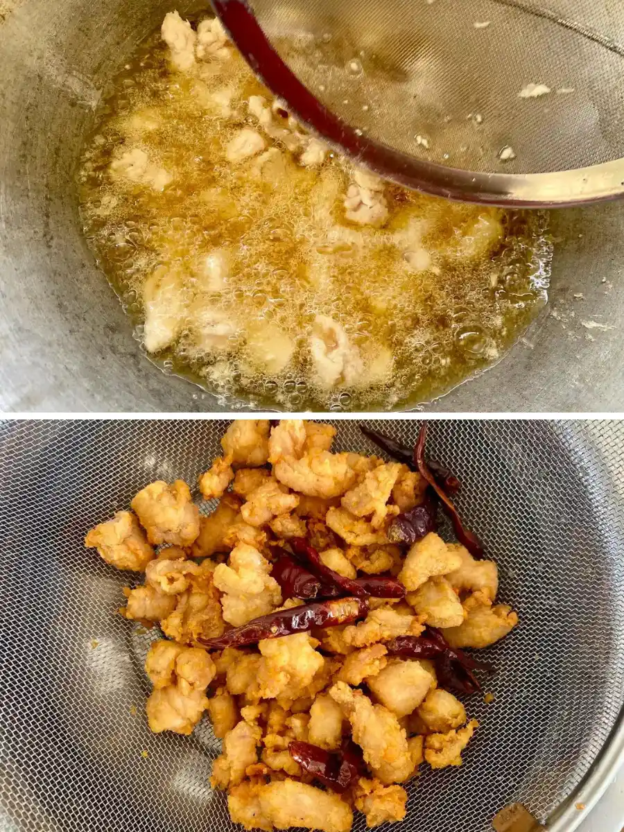 Fried chicken and chilies in a colander.