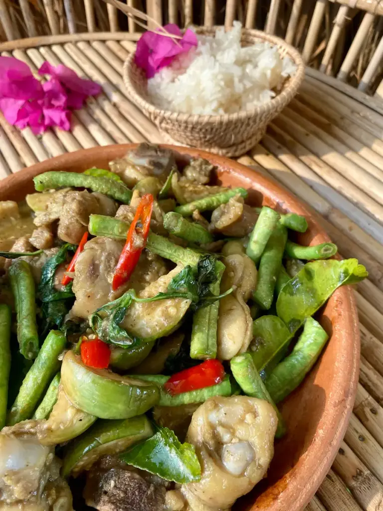 Thai green curry chicken stir-fry vegetables served with rice.