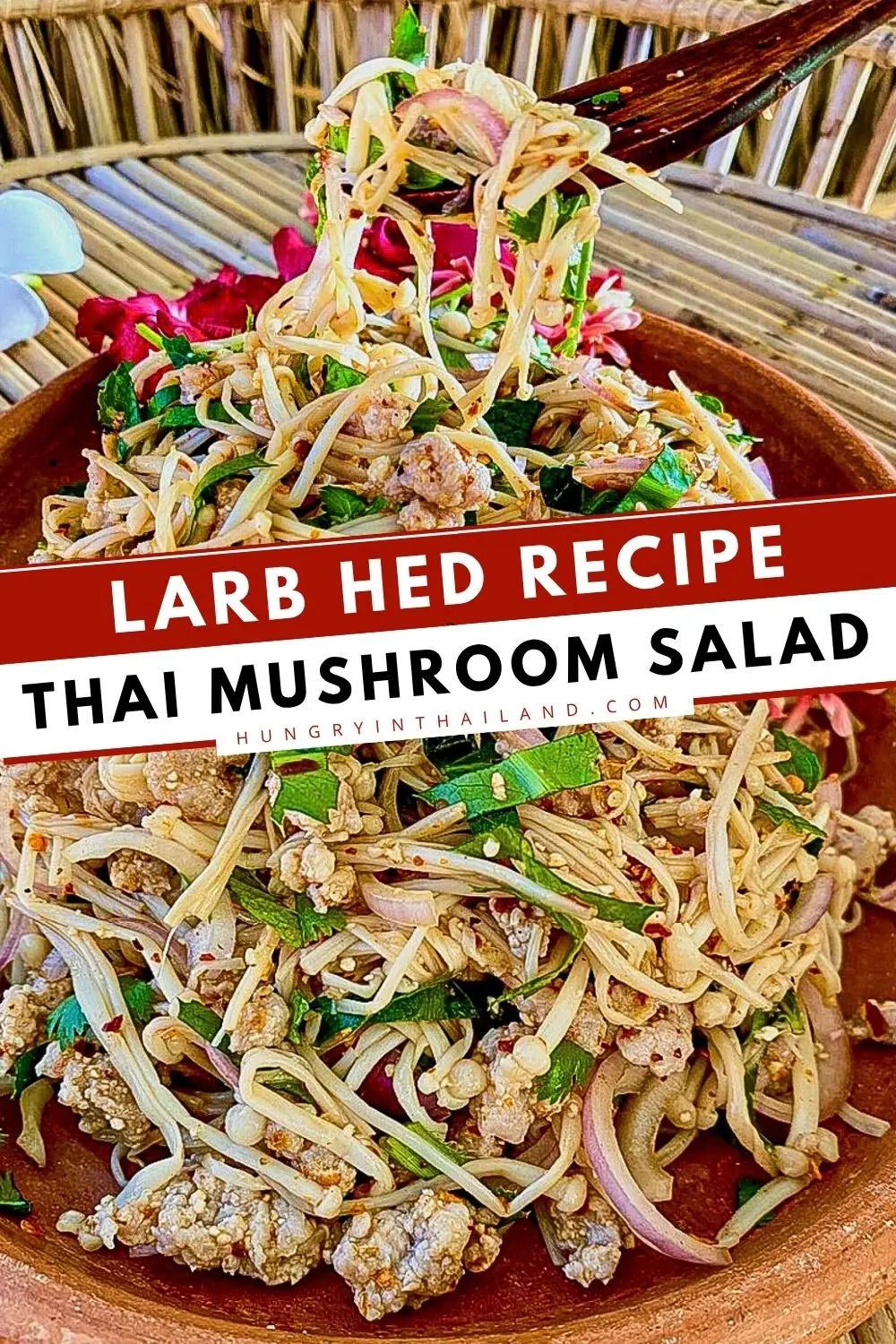 Thai mushroom salad (larb hed) with enoki mushrooms and fresh herbs.