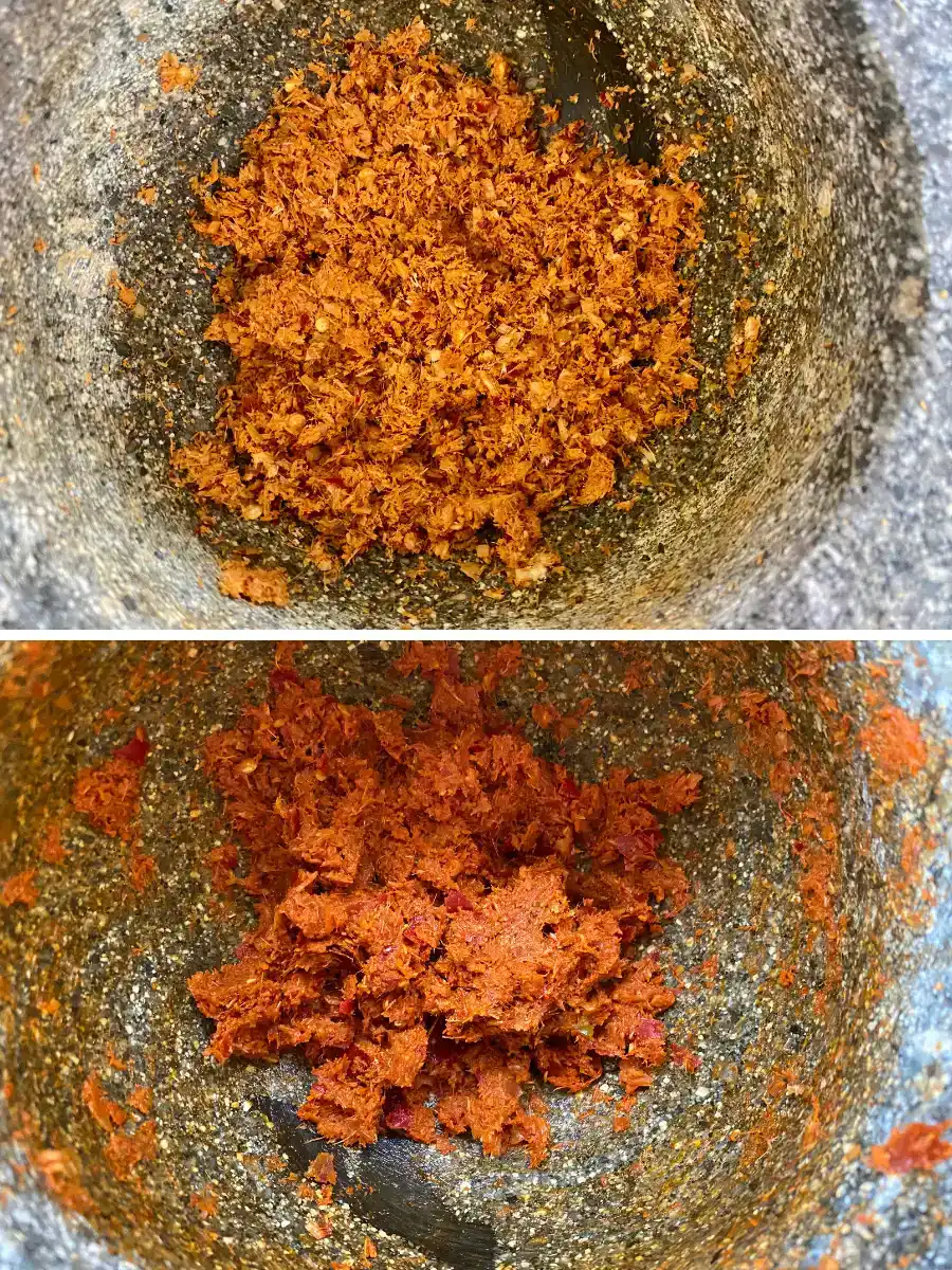 Close-up of homemade panang curry paste in a mortar.