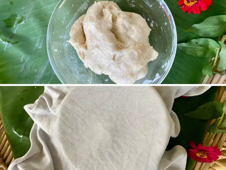 Rested Thai roti dough covered with a damp towel before shaping.