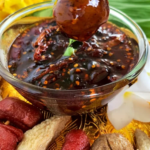 Spicy Thai tamarind dipping sauce with look chin.