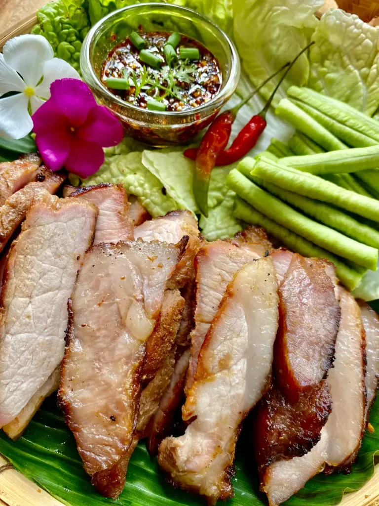 Kor moo yang, Thai grilled pork, served with moo yang sauce.