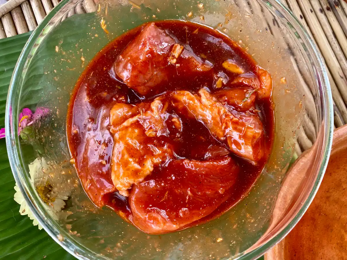 Pork marinated in red sauce.