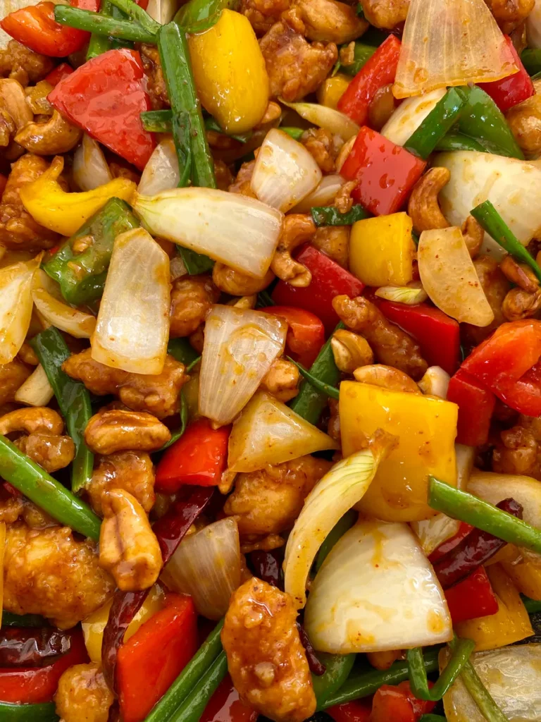 Close-up of Thai chicken cashew featuring vegetables and fried chicken.