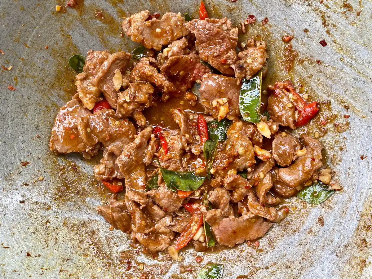 Hot and spicy beef stir-fry in a pan.