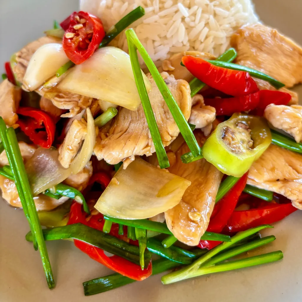 Pad prik sod, stir-fried chicken with fresh chili and vegetables served with steamed jasmine rice.