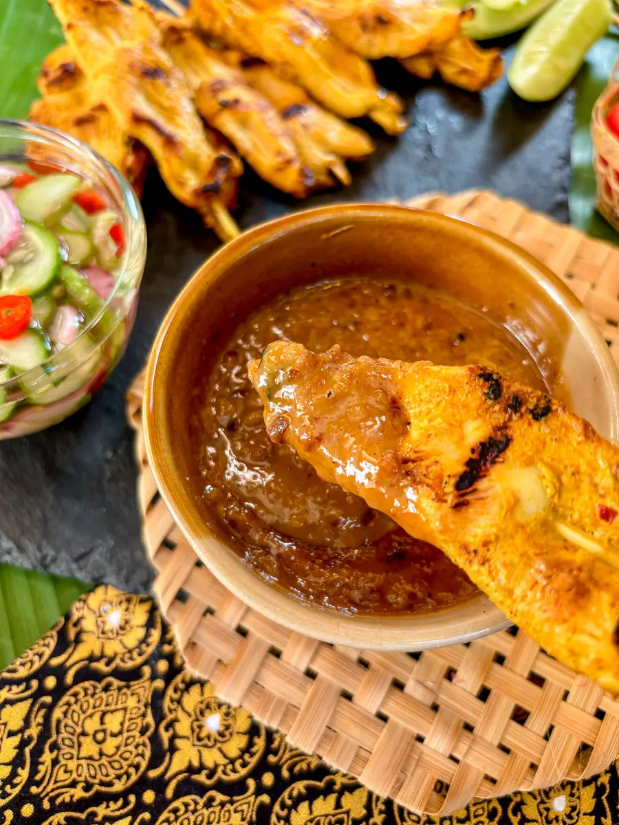 Thai chicken satay with peanut sauce and cucumber salad.
