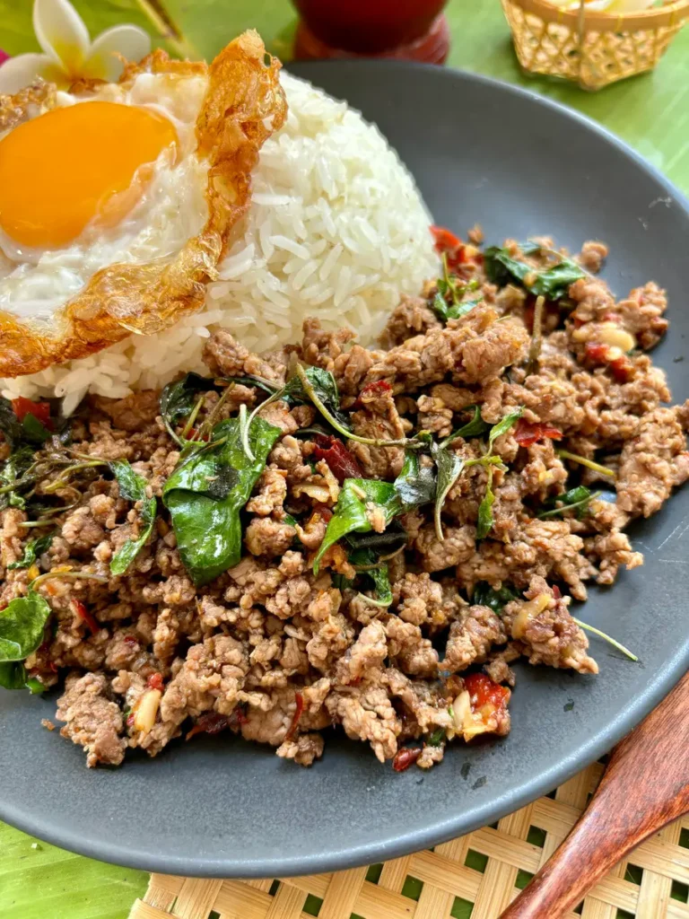 Authentic Thai basil beef with jasmine rice and crispy fried egg.