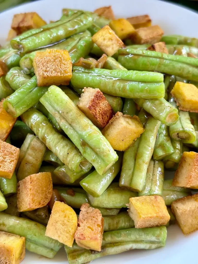 Close-up of long beans stir-fry with tofu.