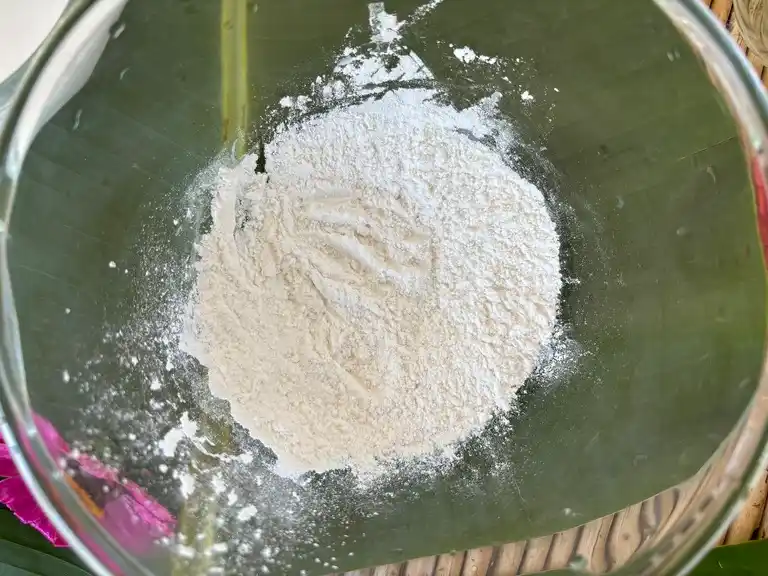 Rice flour mixture in glass bowl.