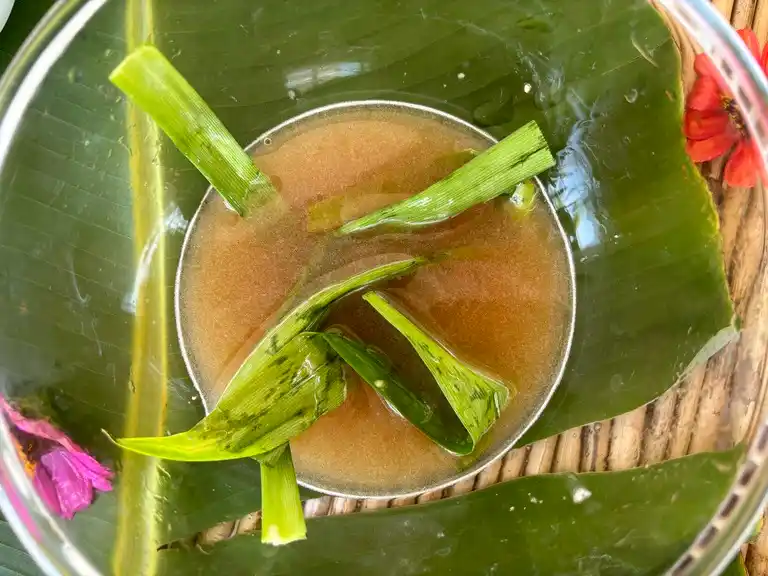 Pandan leaves with coconut sugar in a bowl.