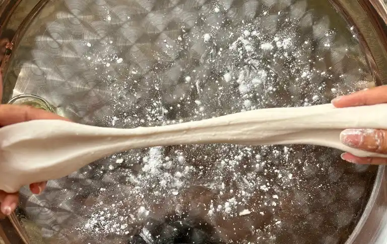 Stretched garlic chive dumpling dough.