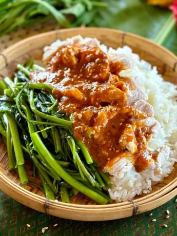 Swimming rama, praram long song, drizzled with peanut sauce and a side of jasmine rice and steamed morning glory.