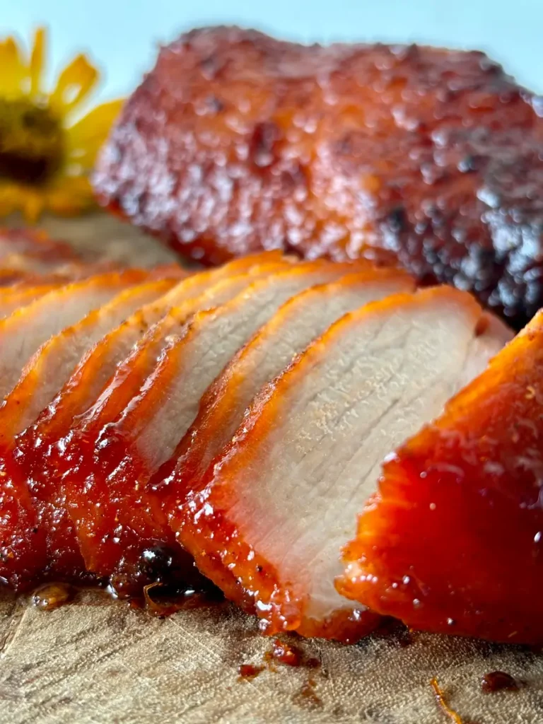 Juicy slices of Thai red pork with a caramelized glaze.