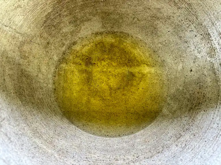 Oil in a wok pan.