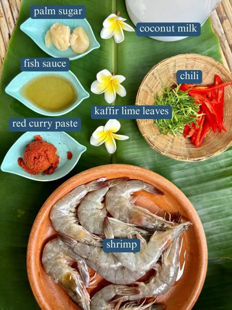 Ingredients for choo chee curry labeled: shrimp, red curry paste, kaffir lime leaves, chili, fish sauce, palm sugar, and coconut milk.