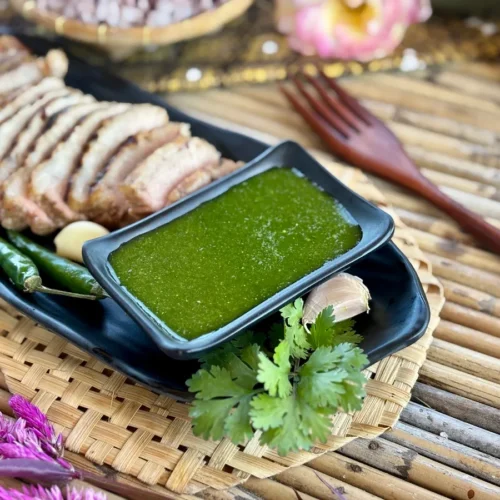 Thai coriander sauce with grilled pork.