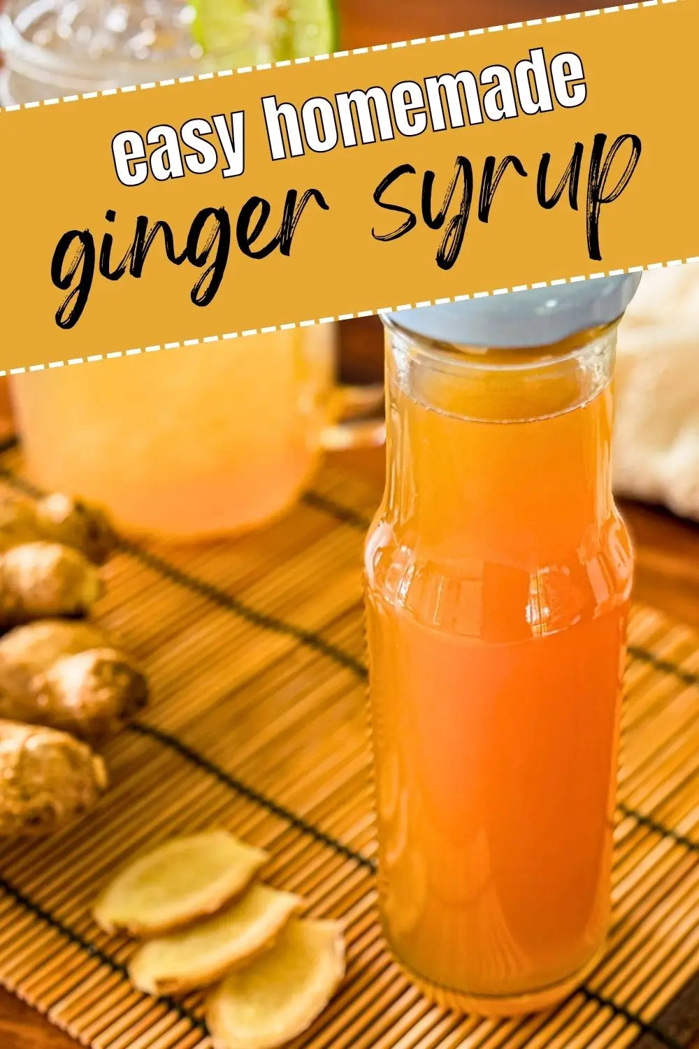 Homemade ginger syrup in a glass bottle with fresh ginger slices.