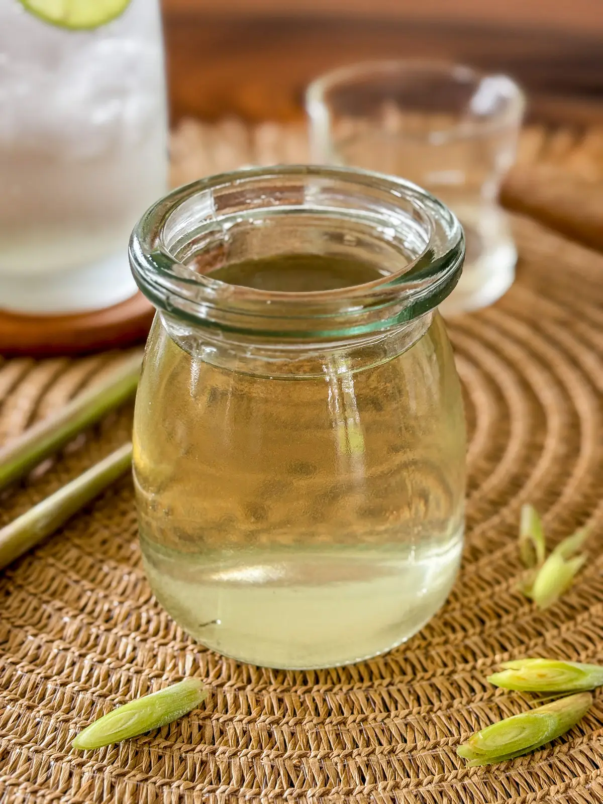 Homemade lemongrass simple syrup in a glass jar.