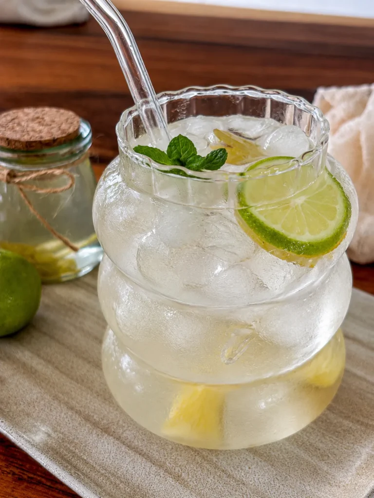 Lime soda with fresh lime, mint, and ice.
