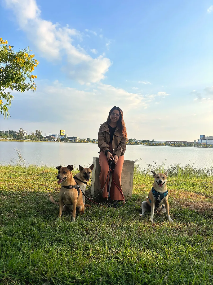 Praew spending time with her three dogs in Thailand